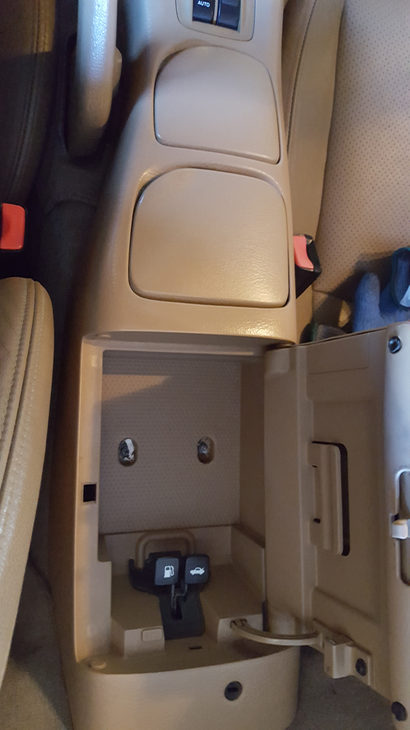 Also remove the two switches inside the storage compartment